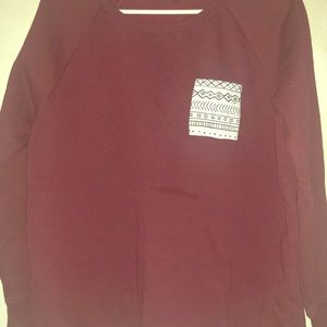 Burgundy/Red pocket sweater.